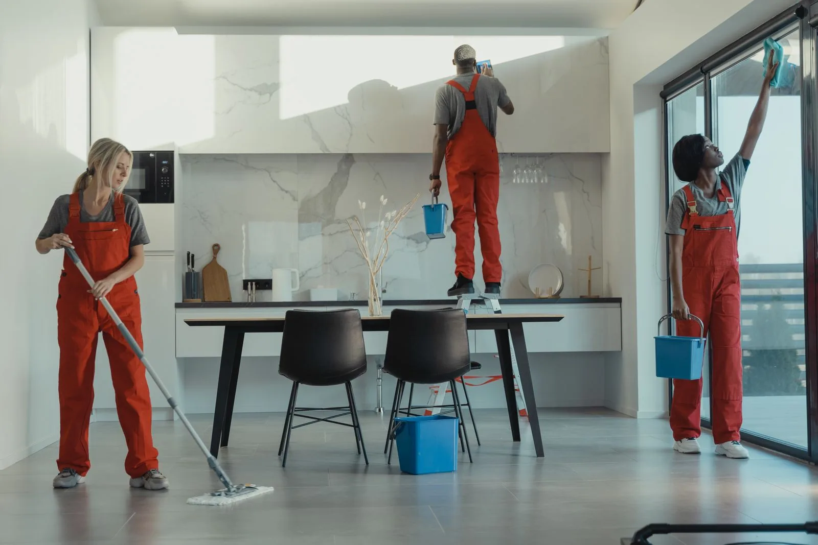 Ecobris cleaning team finishing a Brisbane home